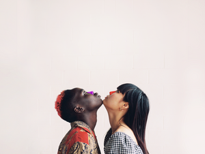 Two women wearing Noz sunscreen on their noses